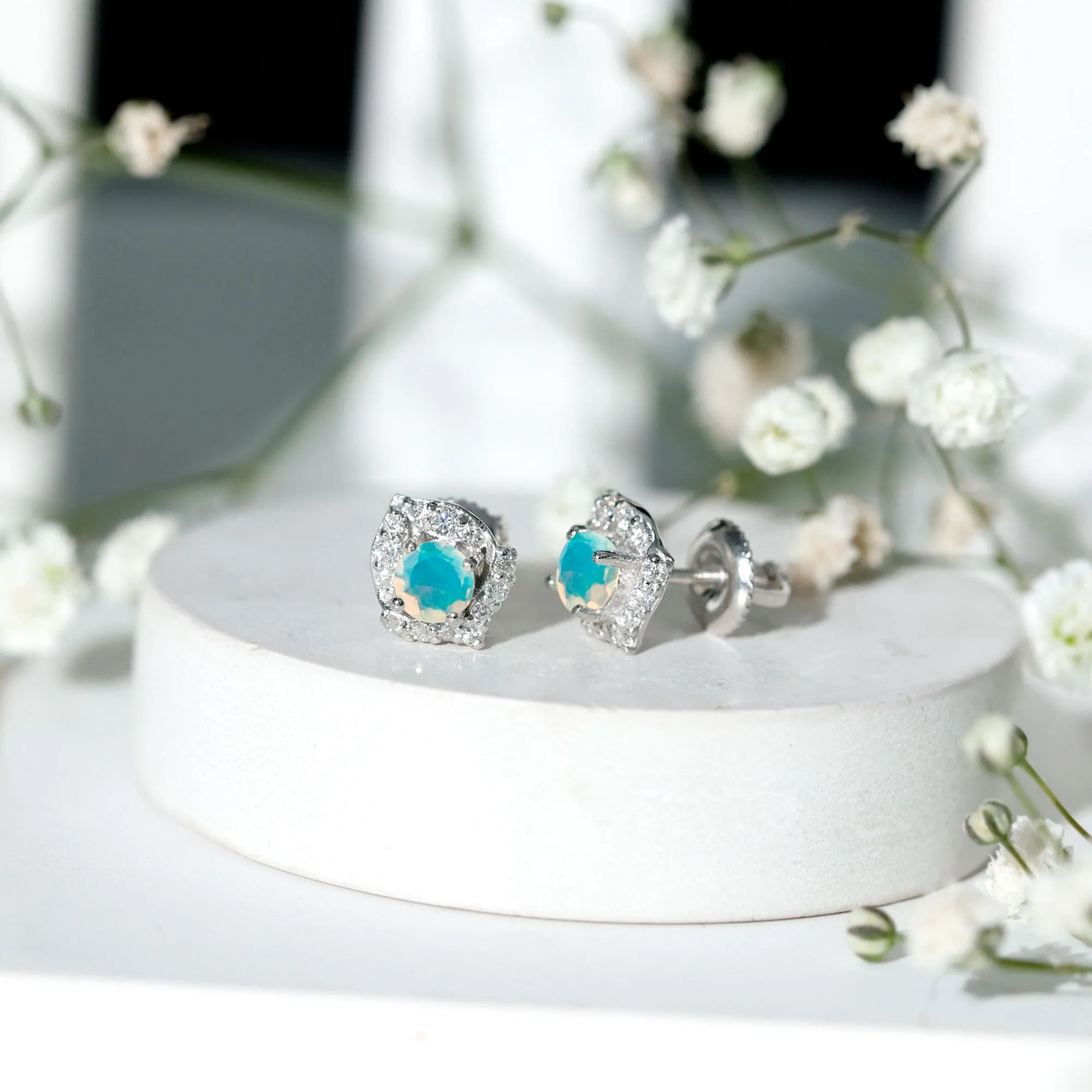 3/4 CT Ethiopian Opal Stud Earrings with Moissanite Accent