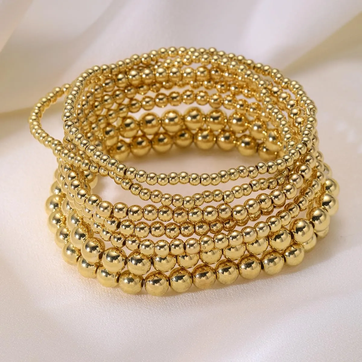 7PCS Layered Beaded Bracelets Set for Women Trendy Stretch Elastic Round Ball Beads Bangles Boho Chunky Gold Stackable Bracelets Dainty Jewelry for Gifts