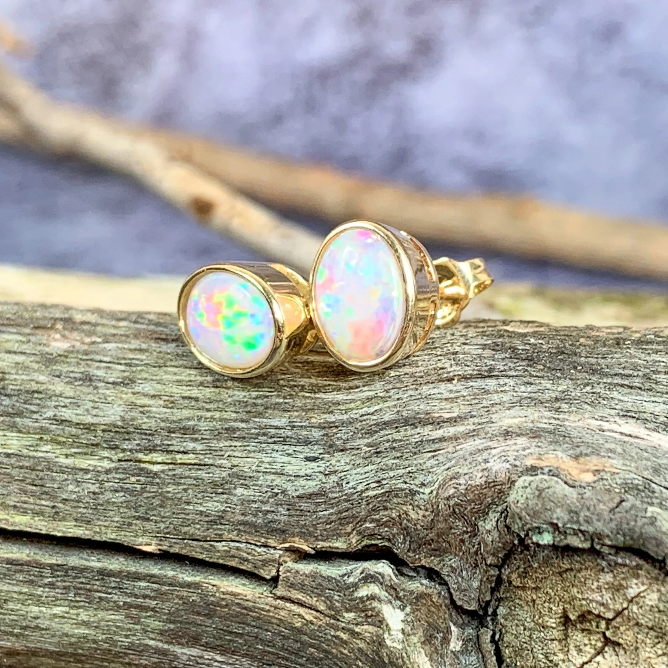 9kt Yellow Gold Oval Opal studs 8x6mm earrings